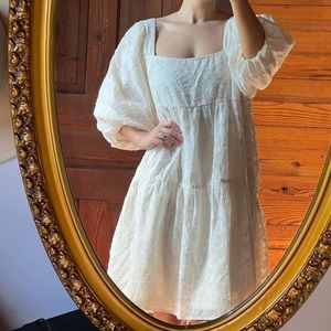 Women’s large puffy sleeve cream dress